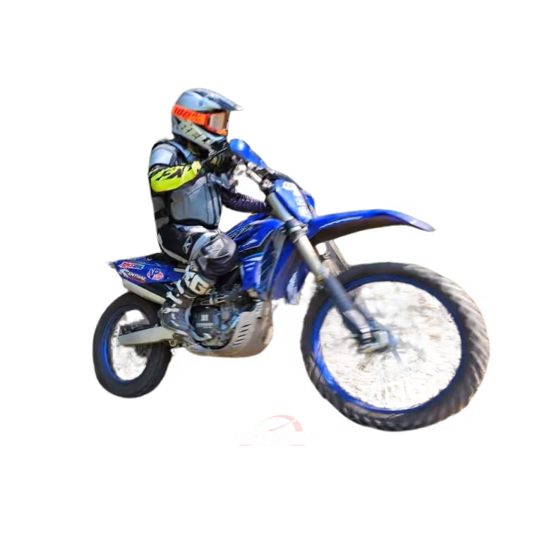 Dirt bike rider jumping on a blue Yamaha motocross bike