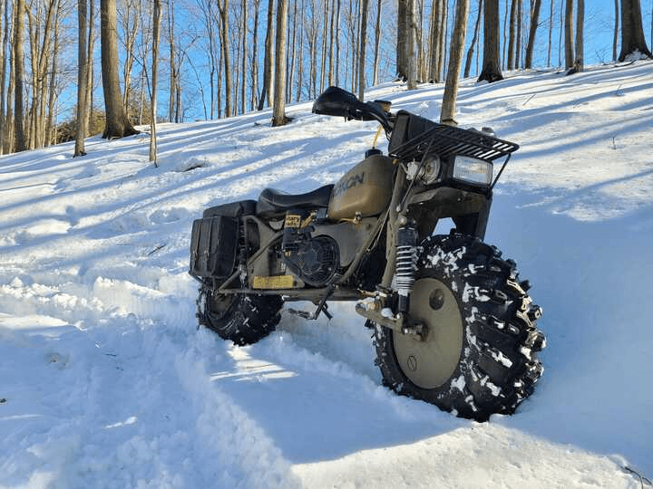 my rokon 2x2 military tactical edition in the snow